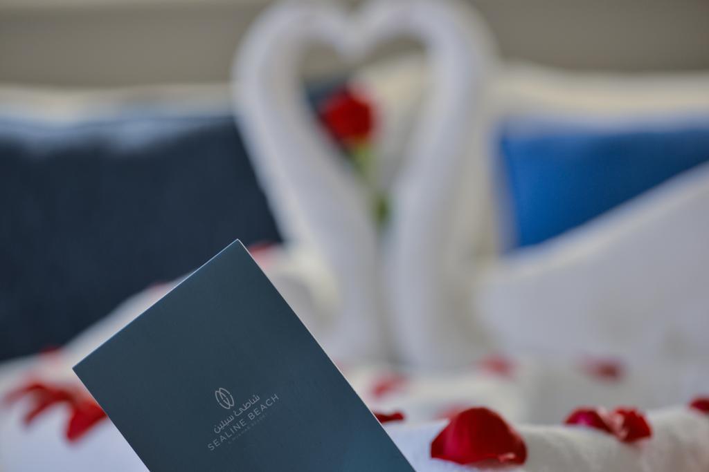 Sealine Beach, A Murwab Resort 메사이드 외부 사진 A menu at the Waldorf Astoria Ras Al Khaimah